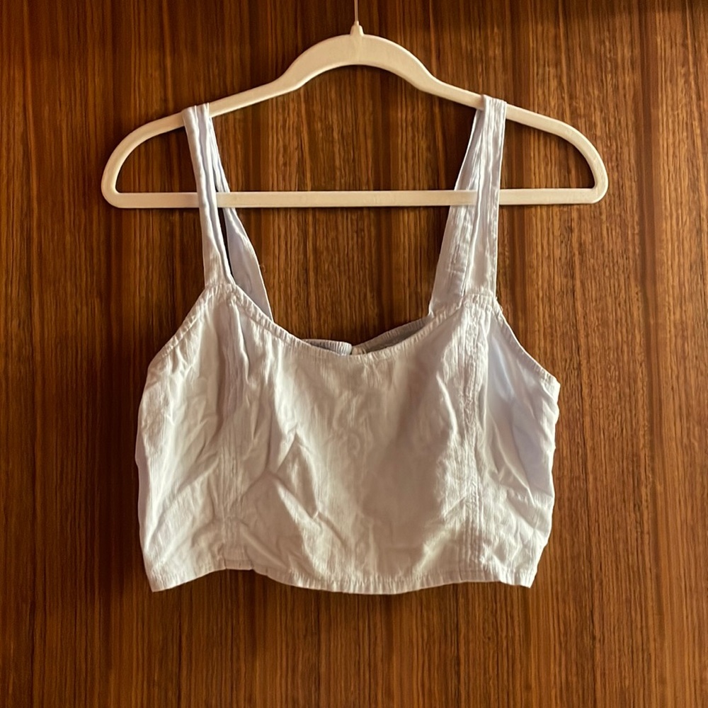 blue tank top, cropped